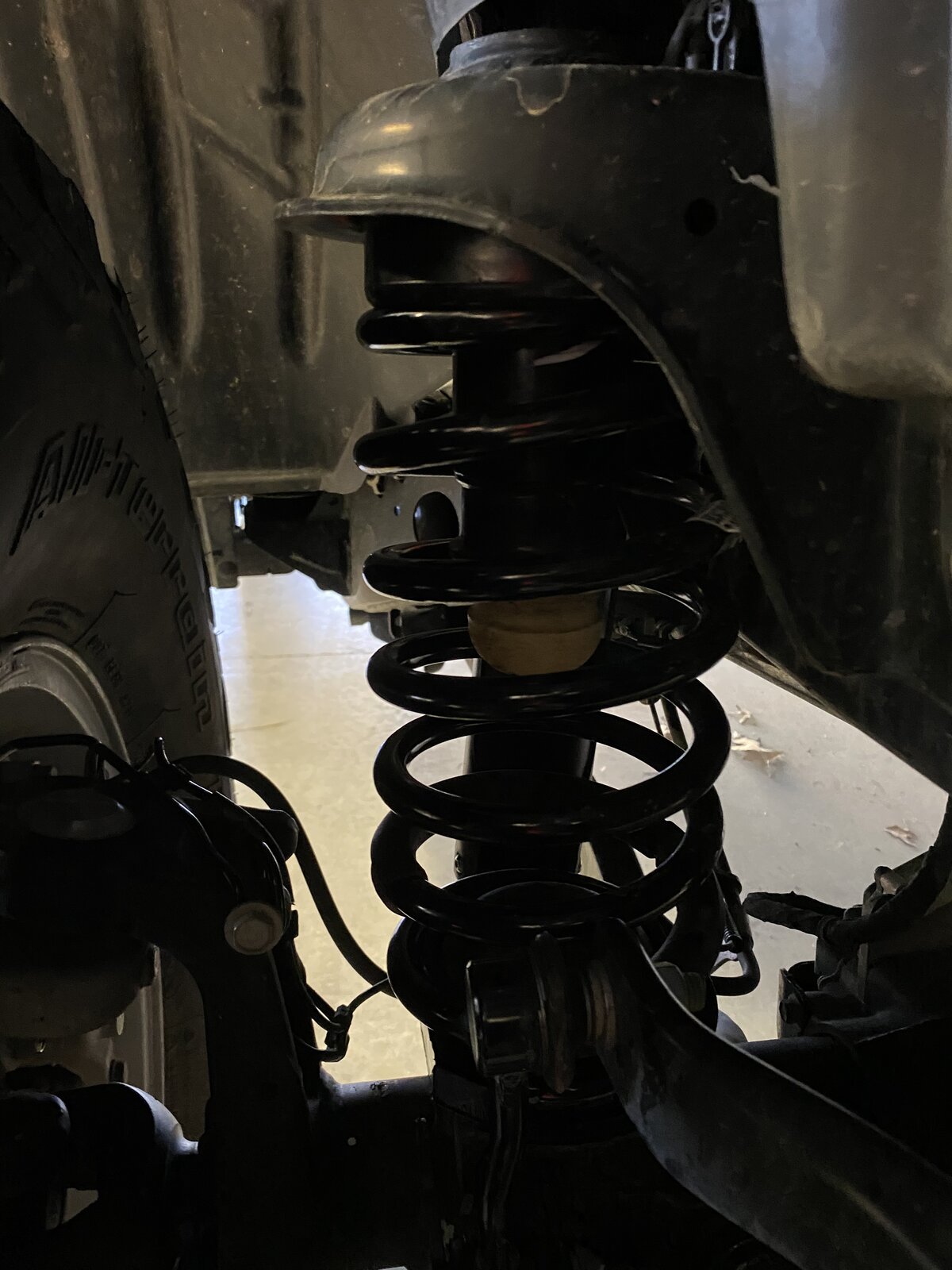 Jeep Gladiator Front coil spring bending after Daystar leveling kit. 27790617-9742-4DA1-9786-ECECA4FB219C