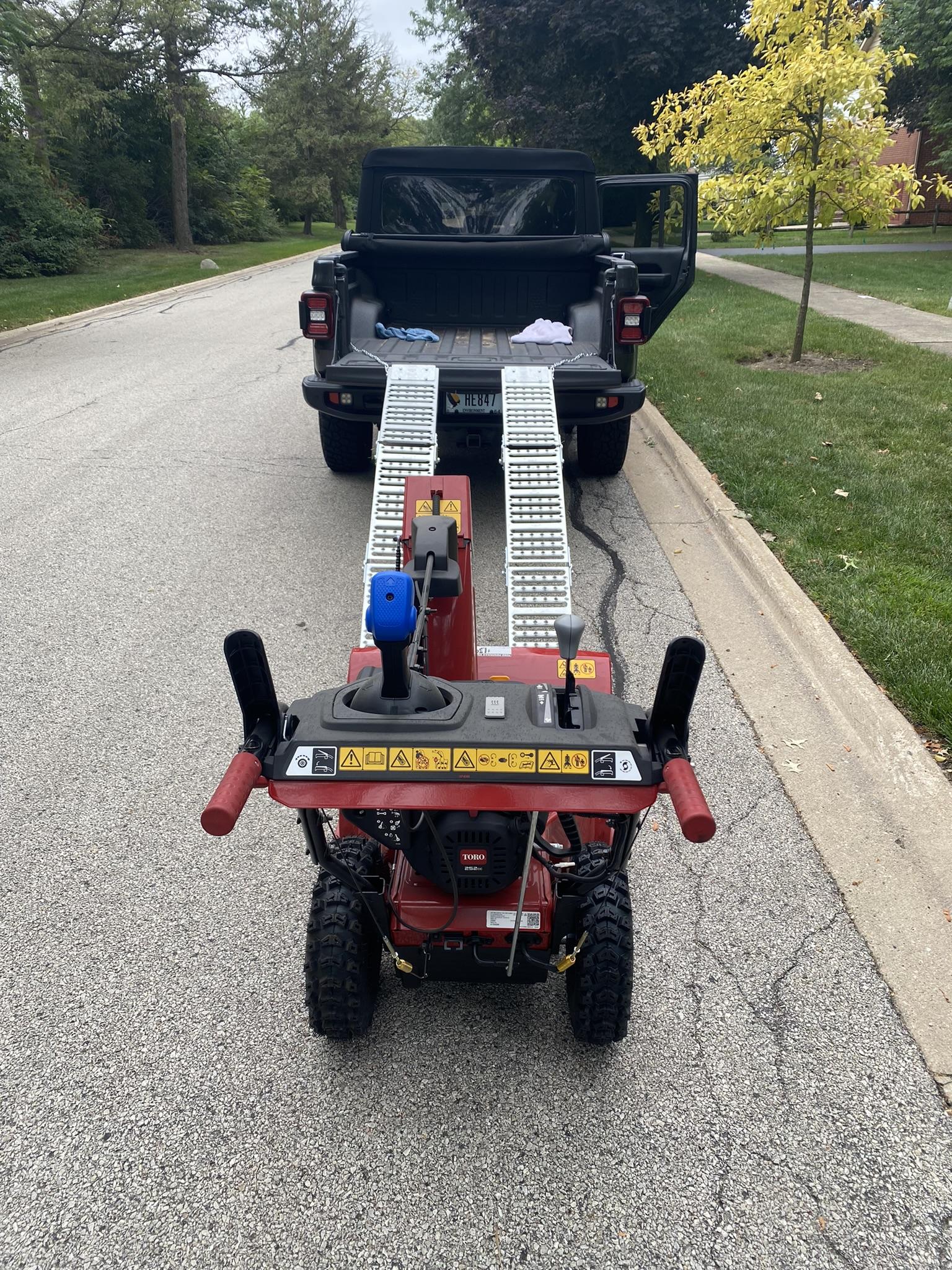 How to load a two-stage snow thrower using bed ramps | Jeep Gladiator ...