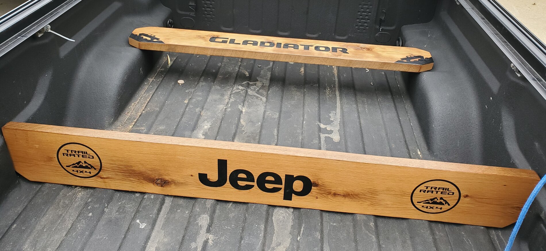 Built this Gladiator bed partition / drywallplywood holder Jeep